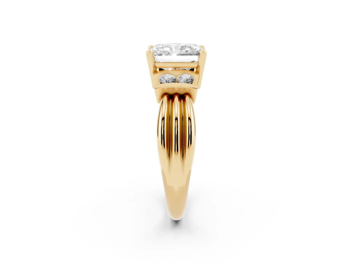 Radiant Cut Cut Three-Stone Channel Set Ring with Bar Prongs Yellow gold