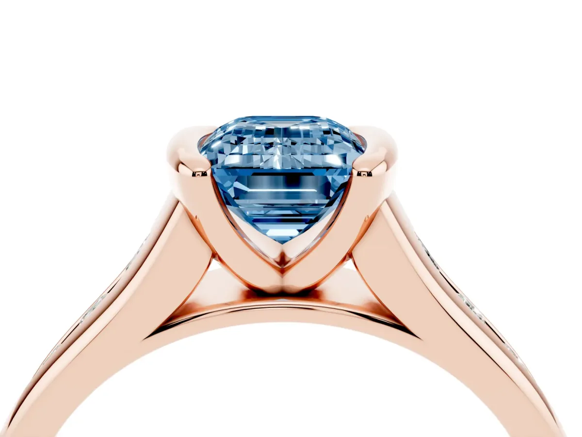 Fancy Blue Emerald Cut Solitaire Bezel-Set Diamond Ring with Channel-Set Band Rose gold