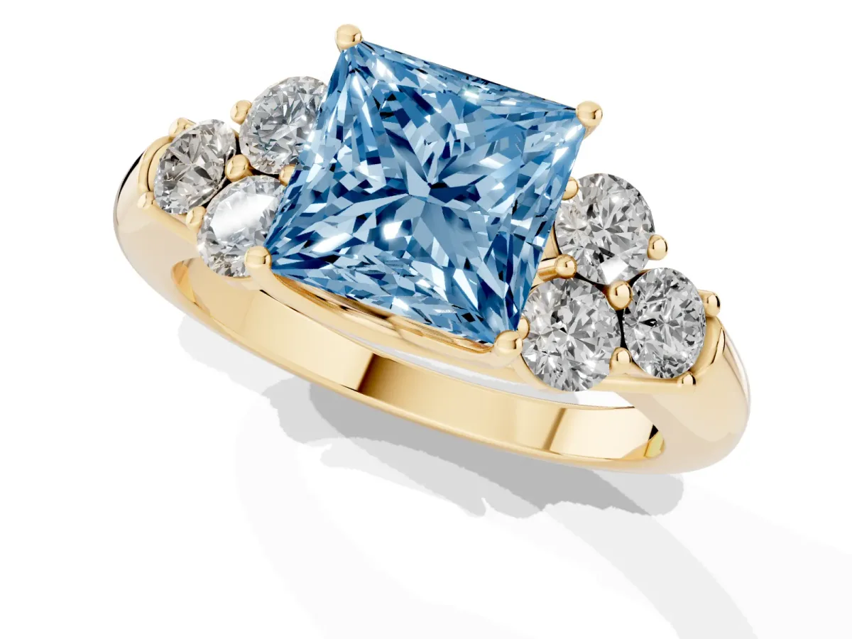 Fancy Blue Princess Cut Cut Diamond Cluster Ring with Round Accent Stones and Prong Setting on a Classic Band Yellow gold