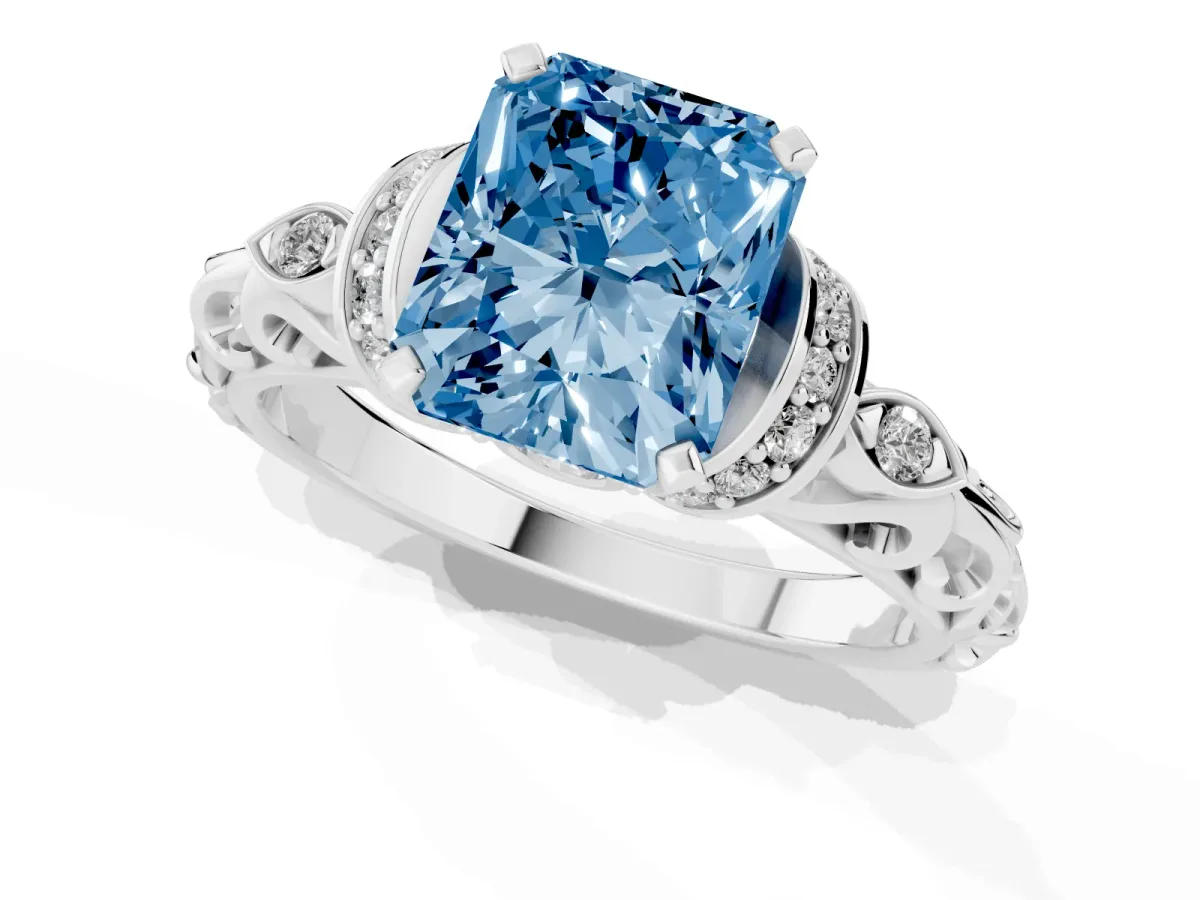 Fancy Blue Radiant Cut Diamond Solitaire Ring with Filigree Band and Four-Prong Setting Silver