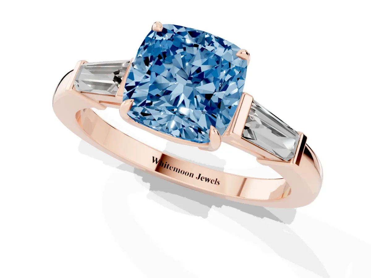 Fancy Blue Cushion Cut Diamond Three-Stone Ring with Tapered Baguette Side Stones and Prong Setting Rose gold