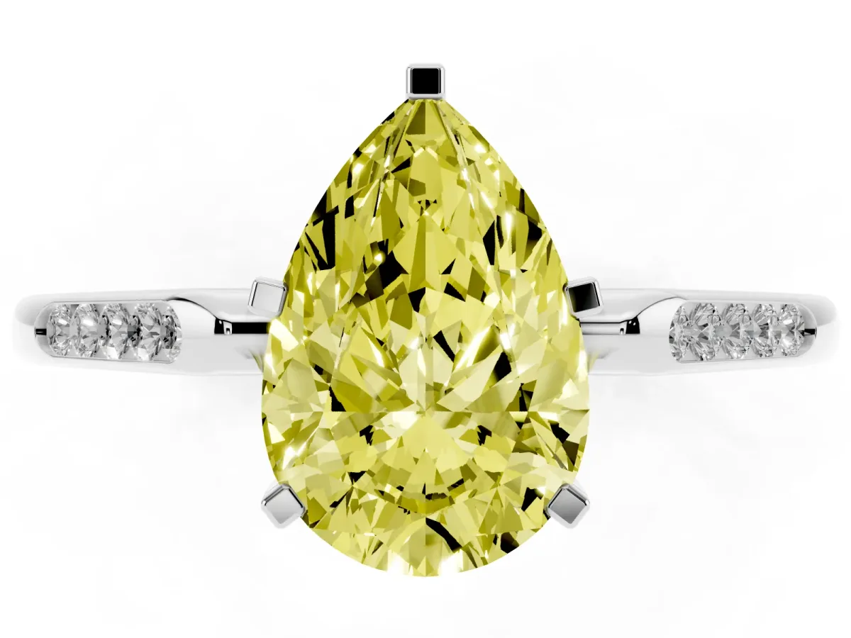 Fancy Yellow Pear Cut Diamond Solitaire Ring with Channel Set Round Band and Prong Setting Silver