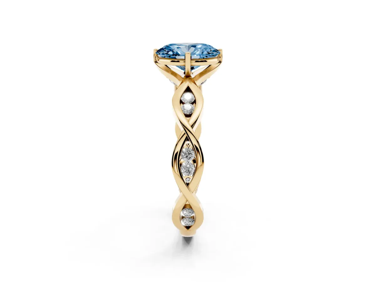 Fancy Blue Oval Cut Solitaire Twist Band with Leaf Prong Setting Yellow gold