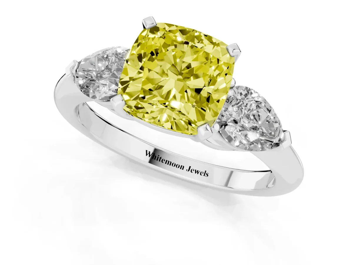 Fancy Yellow Three-Stone Cushion Cut Diamond Ring with Pear Side Stones and Four-Prong Setting Silver