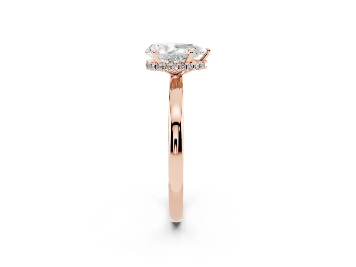 Pear Cut Solitaire Engagement Ring with Cathedral Band and Four-Prong Setting Rose gold