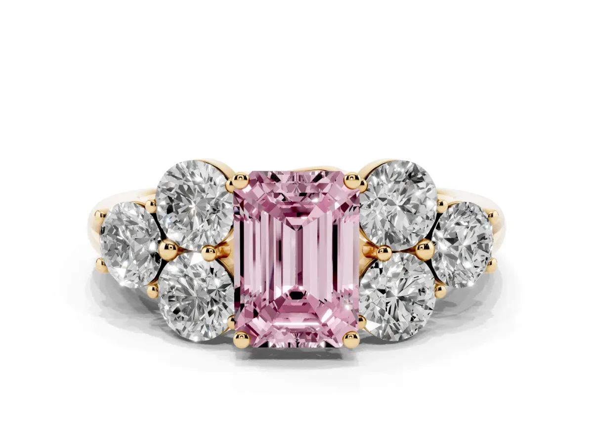 Fancy Pink Emerald Cut Cut Diamond Cluster Ring with Round Accent Stones and Prong Setting on a Classic Band Yellow gold