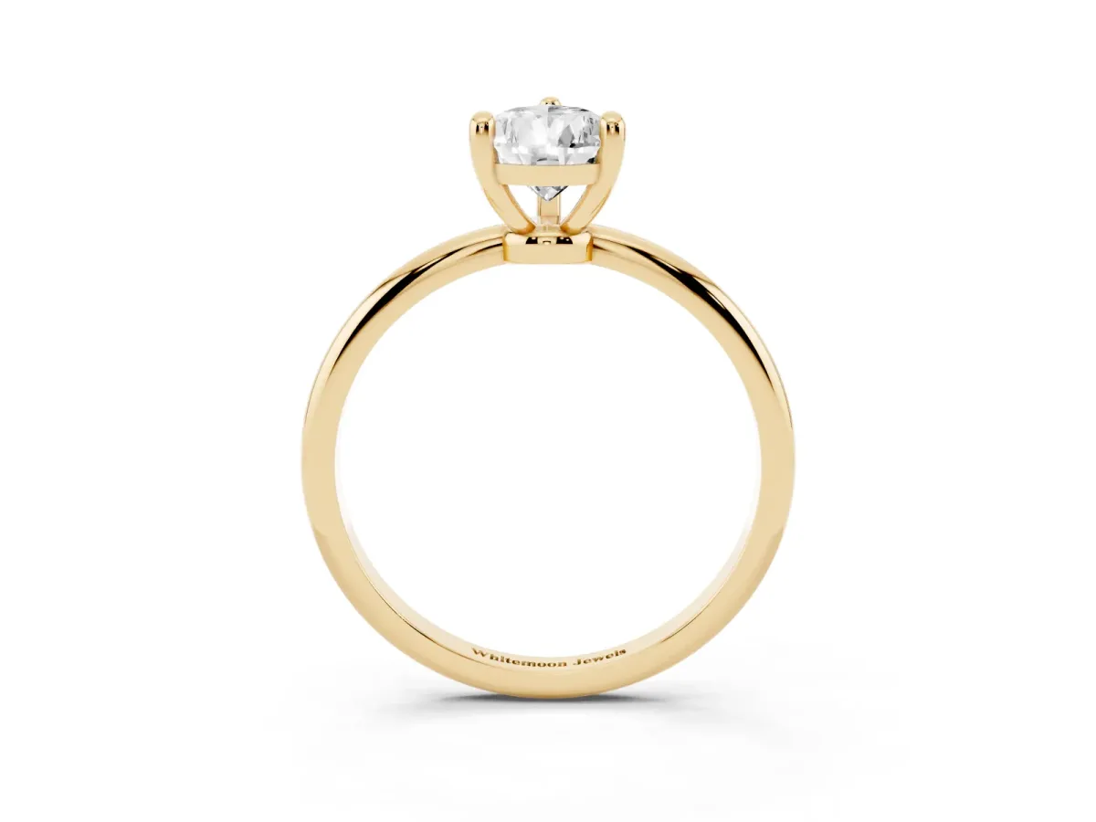 Pear Cut Solitaire Diamond Ring with 4-Prong Setting on a Classic Band Yellow gold