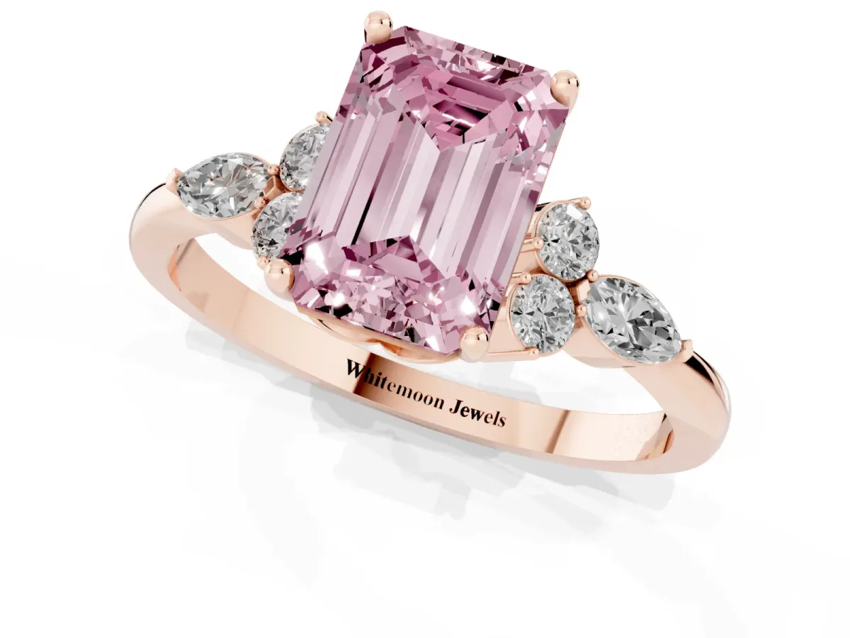 Fancy Pink Emerald Cut Brilliant Diamond Solitaire Ring with Pear Side Stones and Four-Prong Setting Rose gold