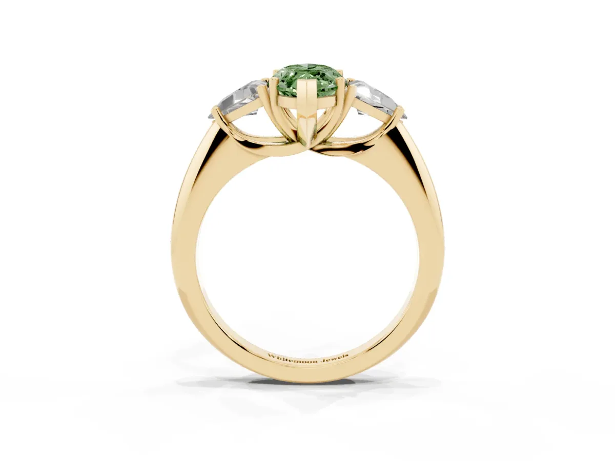 Fancy Green Three-Stone Marquise Cut Diamond Engagement Ring with Trillion Side Stones and Prong Setting Yellow gold