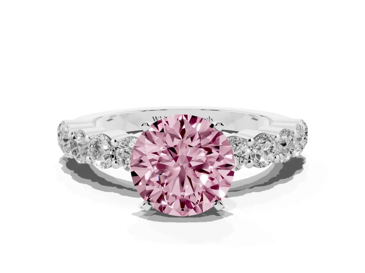 Fancy Pink Round Cut Diamond Solitaire Ring with Shared Prong Round Side Stones Platinum