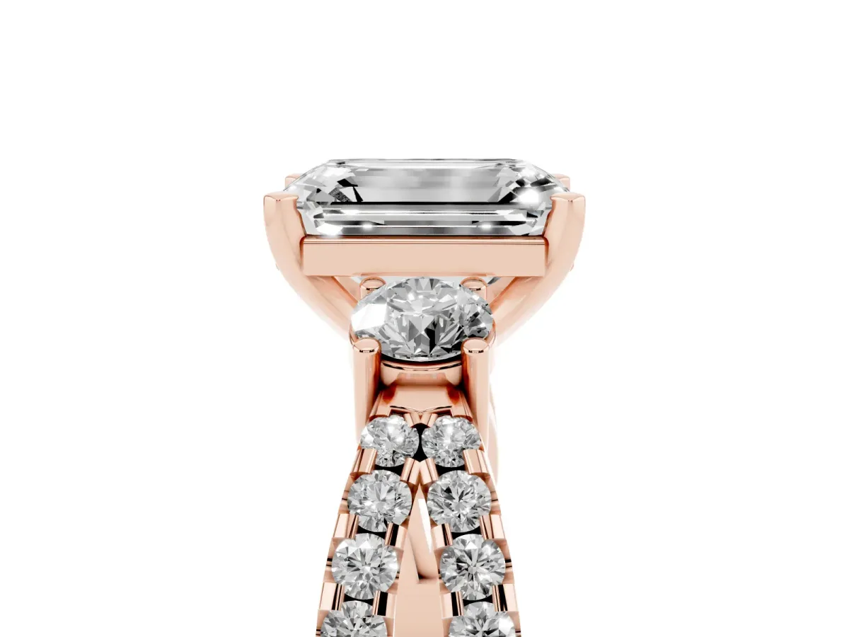 Emerald Cut Diamond Three-Stone Ring with Pavé Split Shank and Four-Prong Setting Rose gold