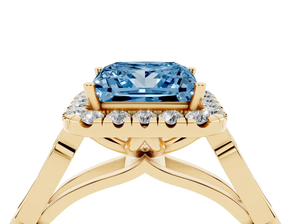 Fancy Blue Princess Cut Halo Diamond Engagement Ring with Filigree Band and Four-Prong Setting Yellow gold