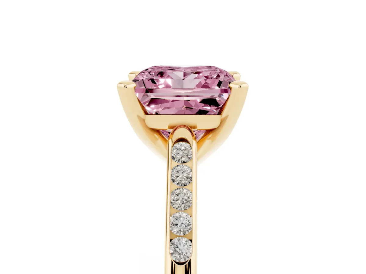 Fancy Pink Princess Cut Diamond Solitaire Ring with Channel Set Round Band and Prong Setting Yellow gold