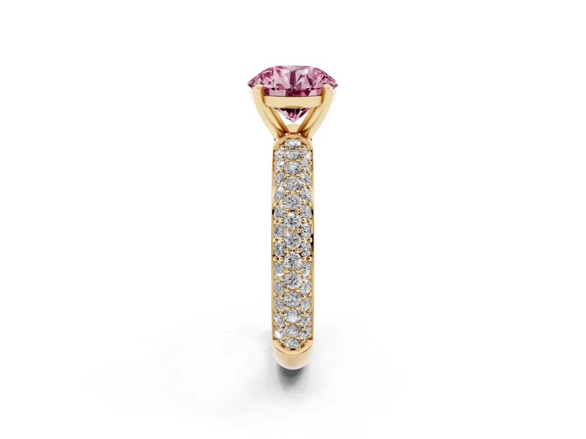 Fancy Pink Round Cut Diamond Solitaire Ring with Prong Setting and Pavé Band Yellow gold