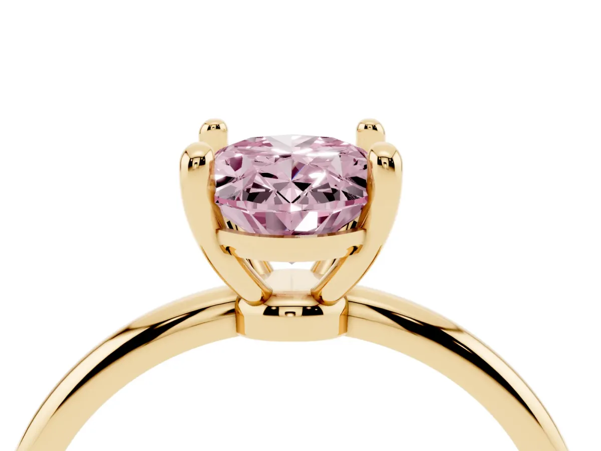 Fancy Pink Oval Cut Solitaire Diamond Ring with 4-Prong Setting on a Classic Band Yellow gold