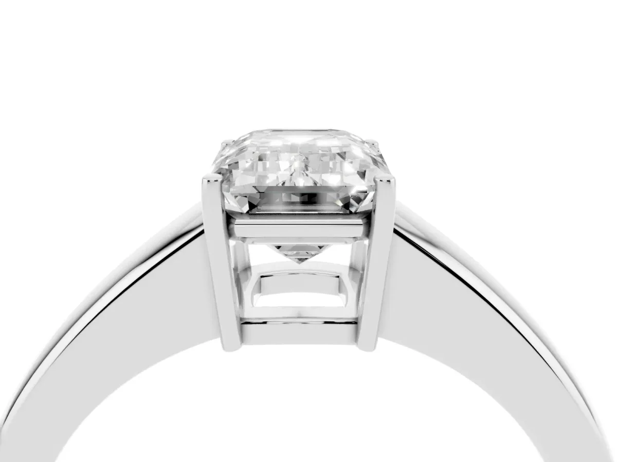 Emerald Cut Solitaire Diamond Ring with Tapered Band and Four-Prong Setting White gold