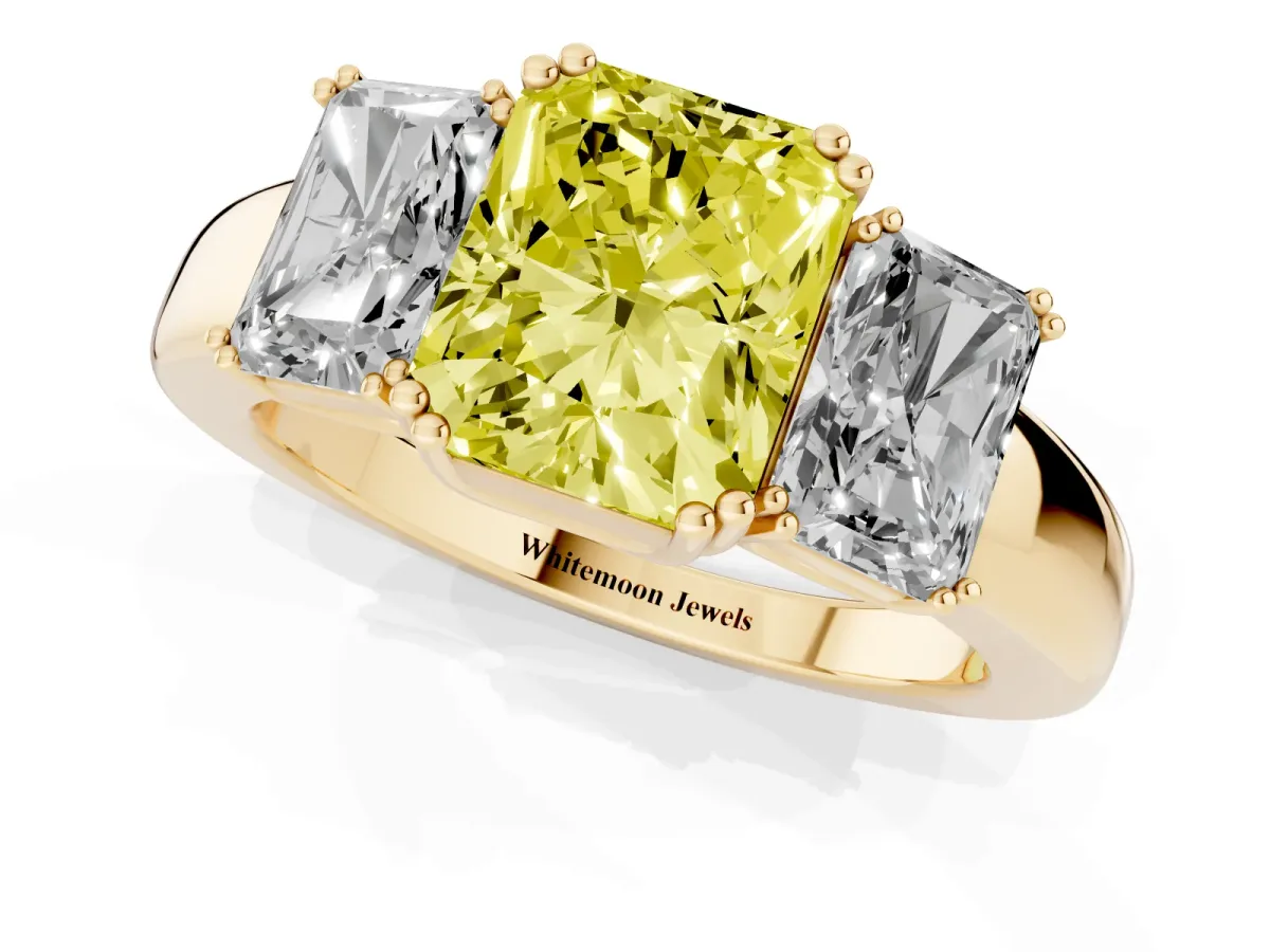 Fancy Yellow Three-Stone Radiant Cut Cut Diamond Ring with Channel Set Band and Four-Prong Setting Yellow gold