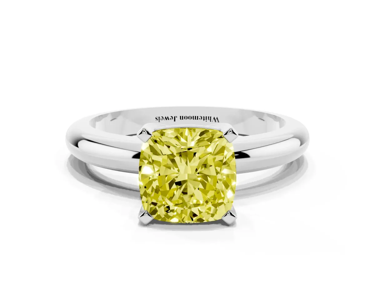 Fancy Yellow Cushion Cut Diamond Solitaire Engagement Ring with Round Band and Four-Prong Setting Platinum
