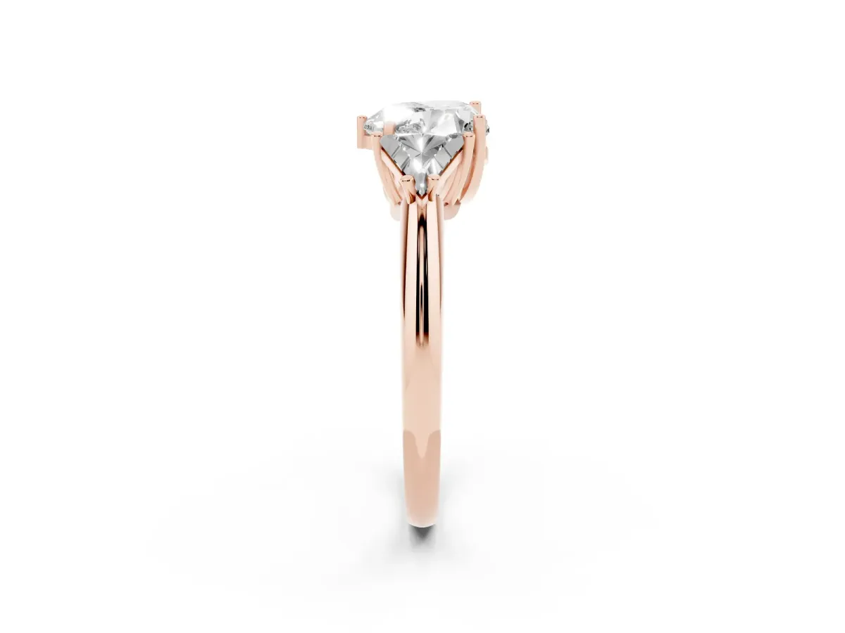 Three-Stone Heart Cut Diamond Engagement Ring with Trillion Side Stones and Prong Setting Rose gold