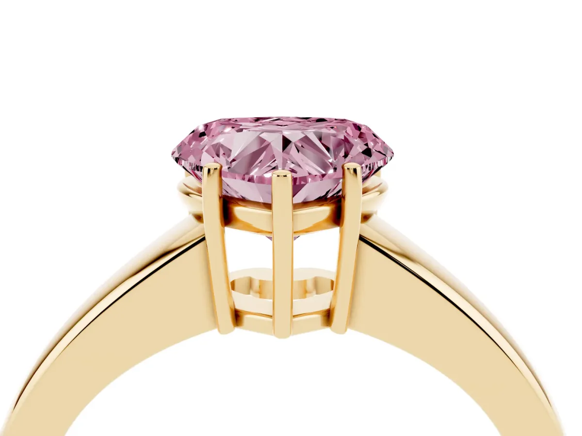 Fancy Pink Heart Cut Solitaire Diamond Ring with Tapered Band and Four-Prong Setting Yellow gold