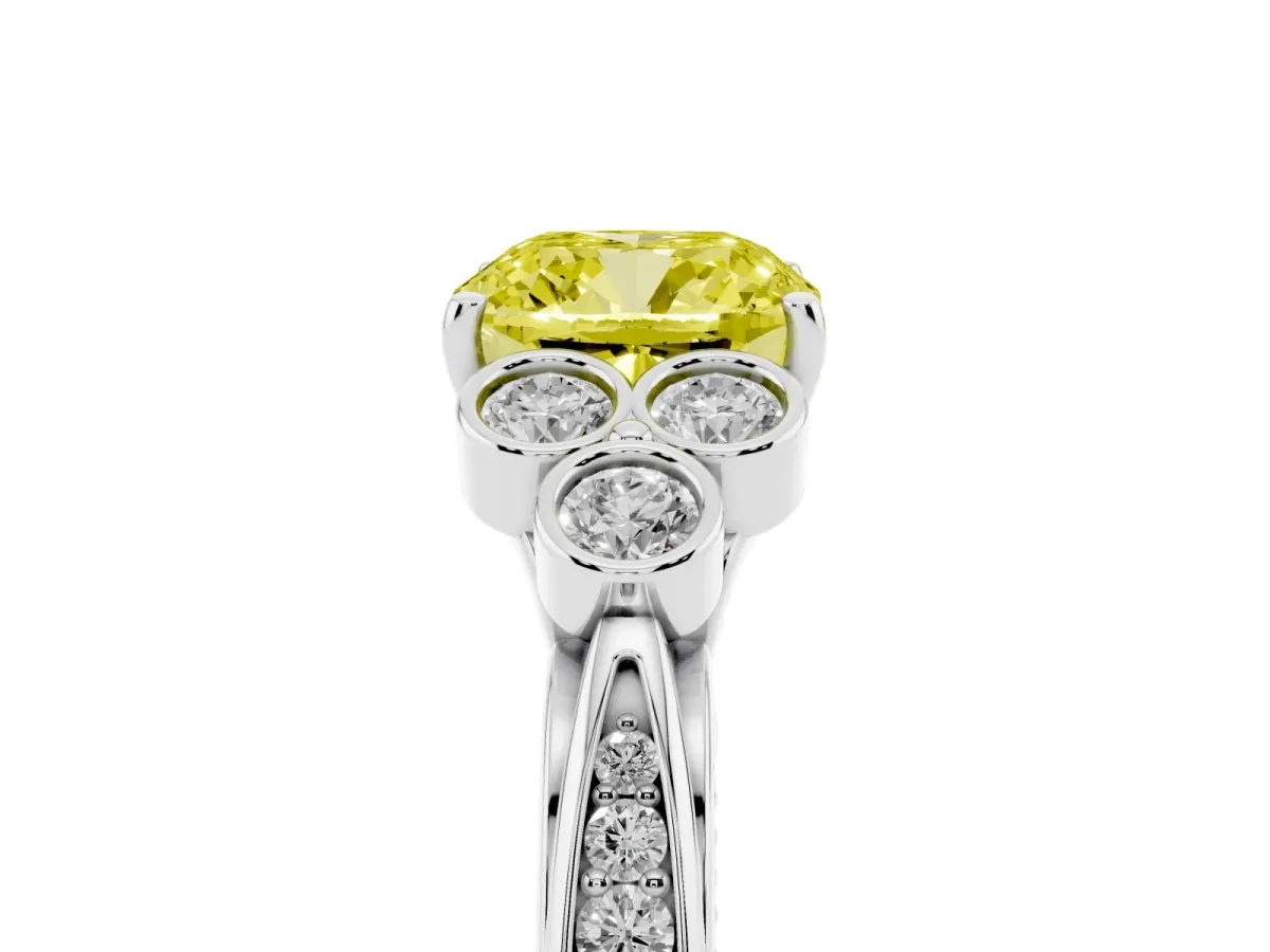 Fancy Yellow Cushion Cut Cut Diamond Engagement Ring with Bezel Set Round Side Stones and Prong Setting Platinum