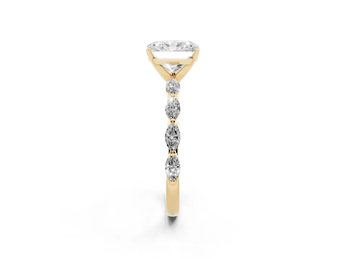 Radiant Cut Diamond Ring with Marquise Side Stones and Prong Setting Yellow gold