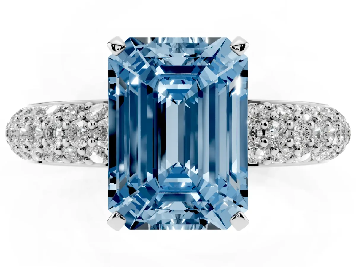 Fancy Blue Emerald Cut Diamond Solitaire Ring with Prong Setting and Pavé Band Silver