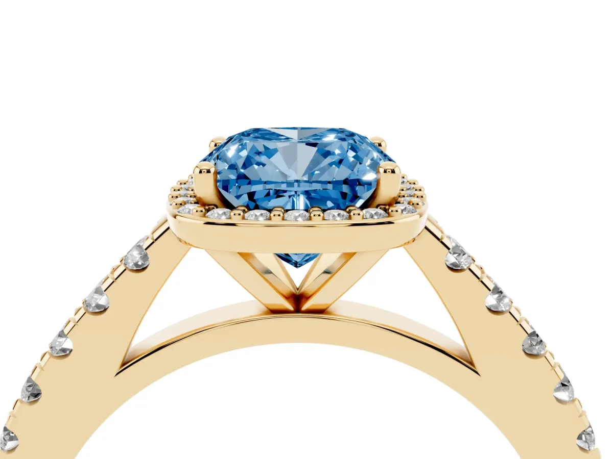 Fancy Blue Cushion Cut Cut Halo Diamond Engagement Ring with Pave Band and Four-Prong Setting Yellow gold