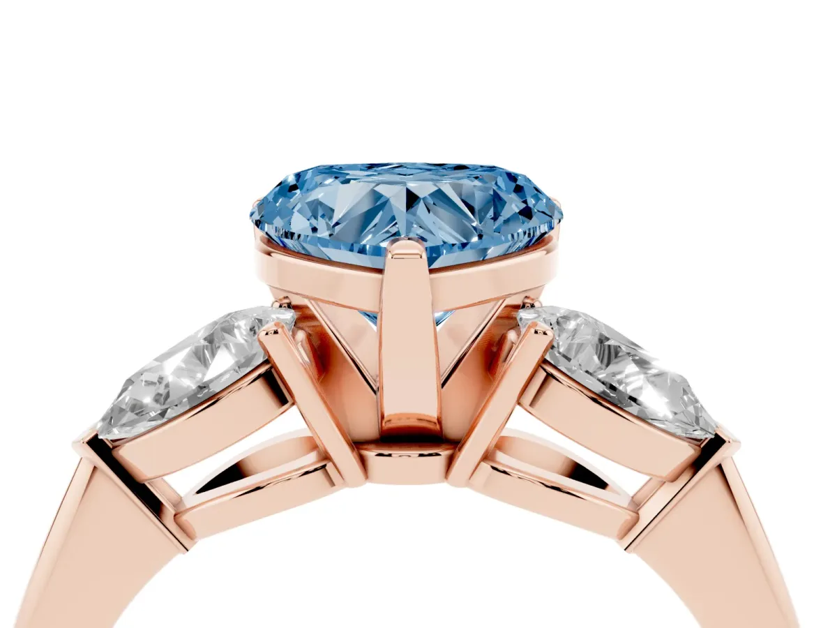 Fancy Blue Three-Stone Heart Cut Diamond Ring with Pear Side Stones and Four-Prong Setting Rose gold