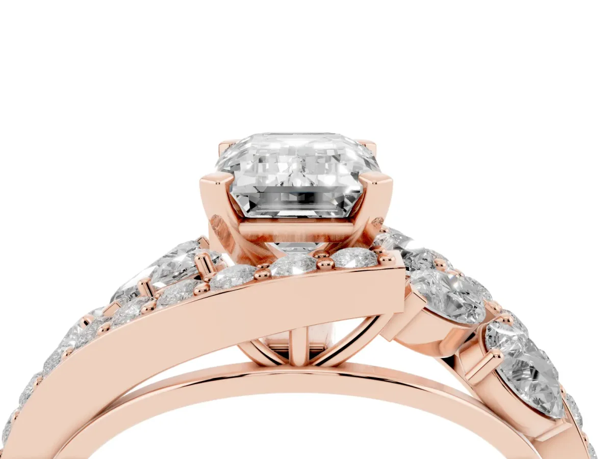 Emerald Cut Diamond Halo Ring with Marquise and Pavé Band in Prong Setting Rose gold