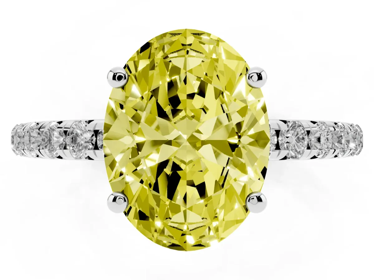 Fancy Yellow Oval Cut Cut Diamond Solitaire Ring with Micro Pave Band and Four Prong Setting Silver
