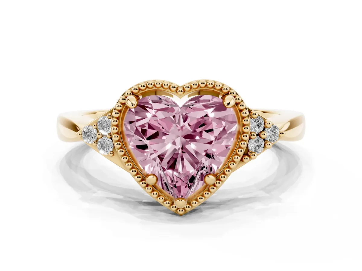 Fancy Pink Heart Cut Diamond Halo Ring with Tapered Band and Four-Prong Setting Yellow gold