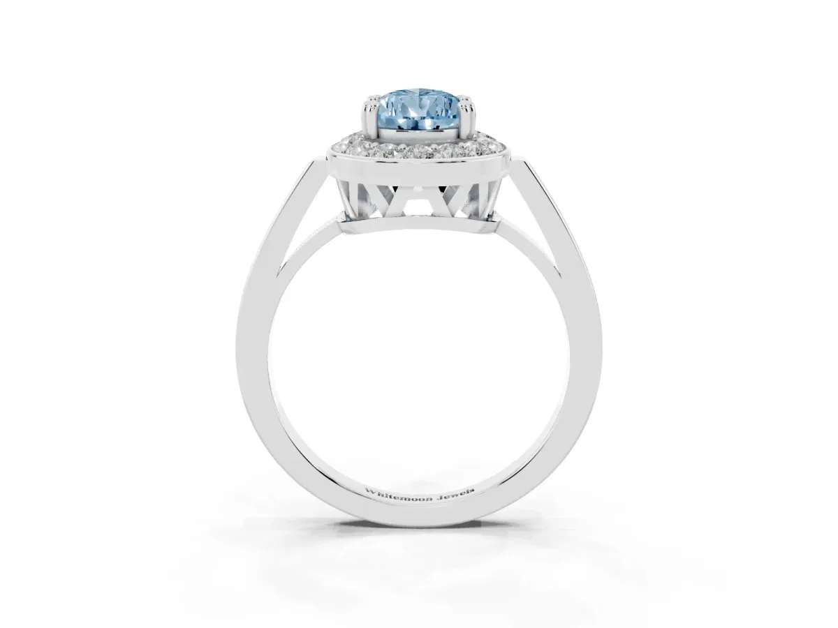 Fancy Blue Pear Cut Diamond Halo Ring with Split Shank and Four-Prong Setting Platinum