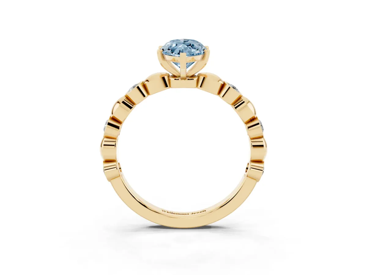 Fancy Blue Marquise Cut Solitaire Bezel-Set Diamond Ring with Beaded Band and Four-Prong Setting Yellow gold