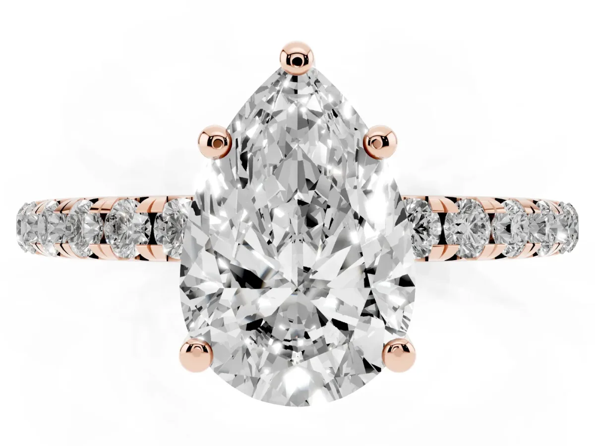 Pear Cut Cut Diamond Solitaire Ring with Micro Pave Band and Four Prong Setting Rose gold