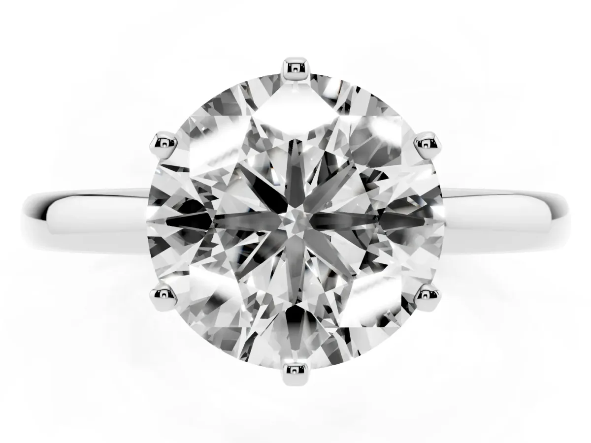 Round Cut Solitaire Diamond Ring with Six-Prong Setting on a Classic Band Silver