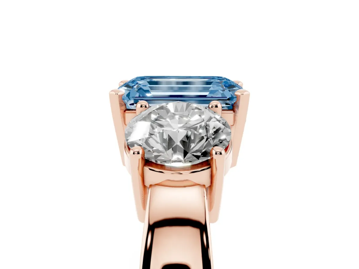 Fancy Blue Three-Stone Emerald Cut Diamond Ring with Round Side Stones, Classic Band, and Four-Prong Setting Rose gold