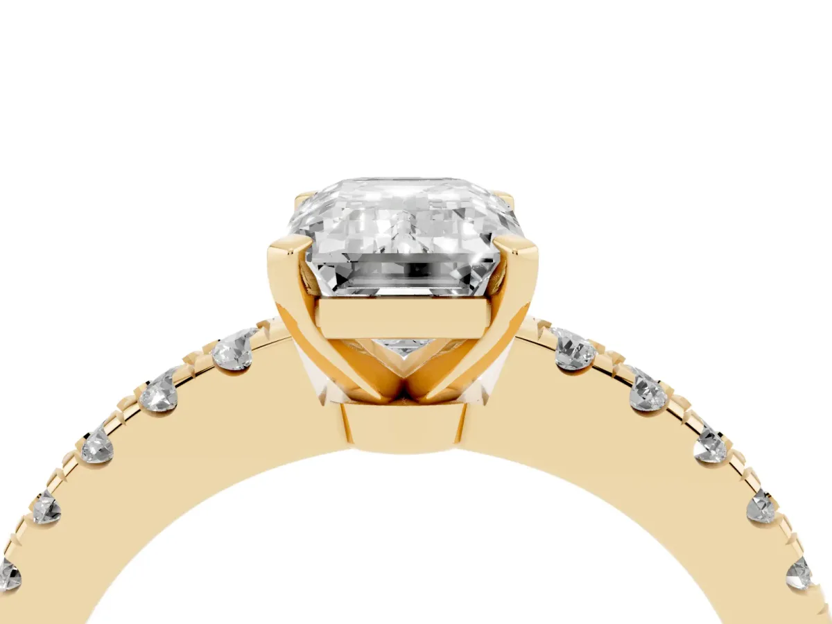 Emerald Cut Solitaire Diamond with Pavé Band and Four-Prong Setting Yellow gold