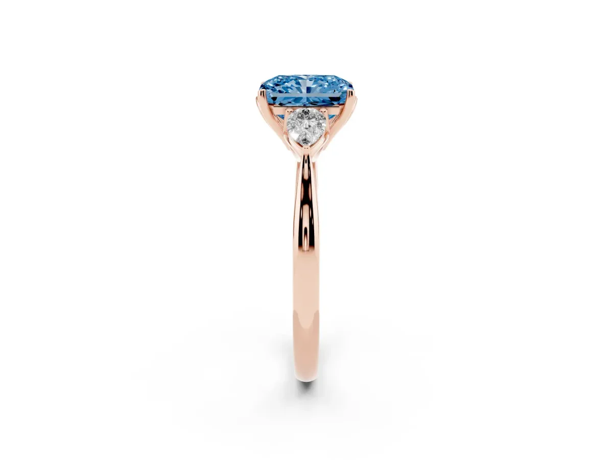 Fancy Blue Three-Stone Radiant Cut Brilliant Diamond Solitaire Ring with Tapered Band and Four-Prong Setting Rose gold