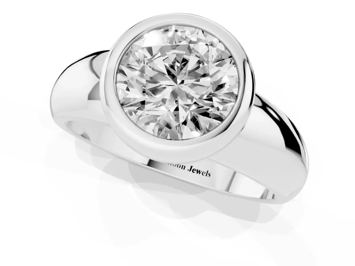 Bezel Set Round Cut Solitaire Ring with Wide Band Platinum