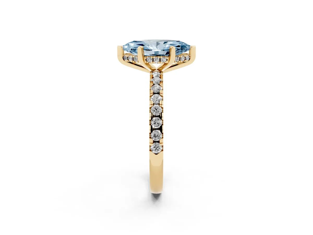Fancy Blue Marquise Cut Diamond Solitaire Ring with Round Pavé Band and Four-Prong Setting Yellow gold