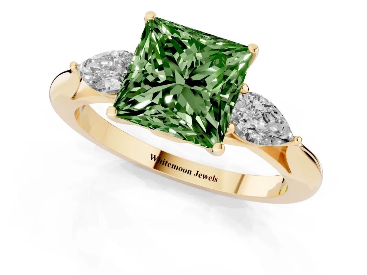 Fancy Green Princess Cut Diamond Three-Stone Ring with Pear Side Stones and Prong Setting Yellow gold