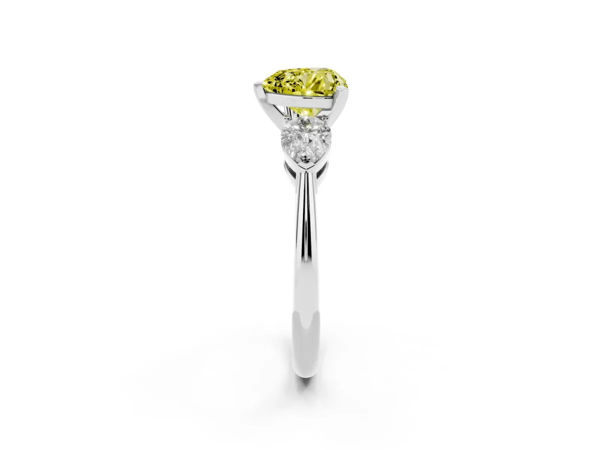 Fancy Yellow Three-Stone Heart Cut Diamond Ring with Pear Side Stones and Four-Prong Setting Silver