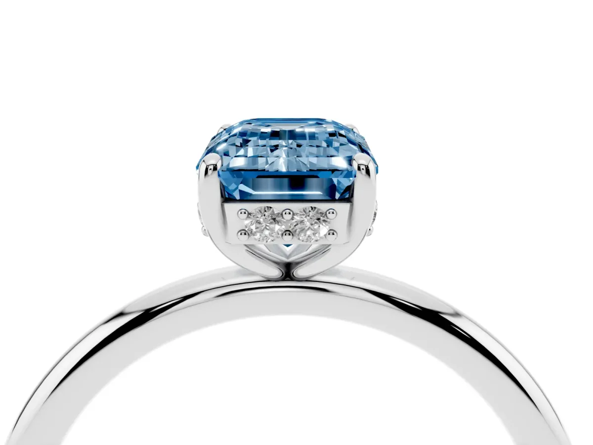 Fancy Blue Emerald Cut Solitaire Diamond Ring with a Classic Band and Four-Prong Setting Platinum