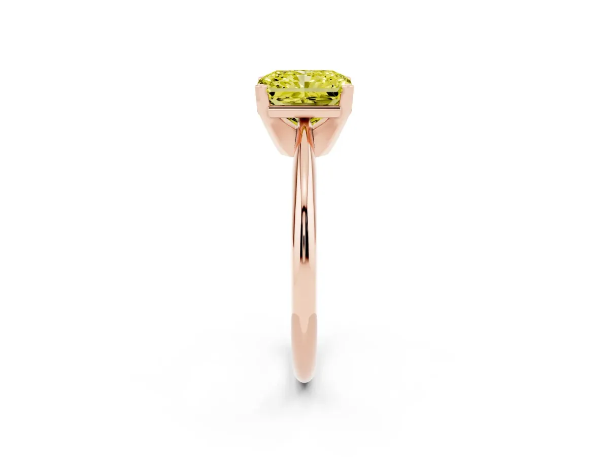 Fancy Yellow Radiant Cut Cut Solitaire Ring with Four-Prong Setting on a Classic Band Rose gold