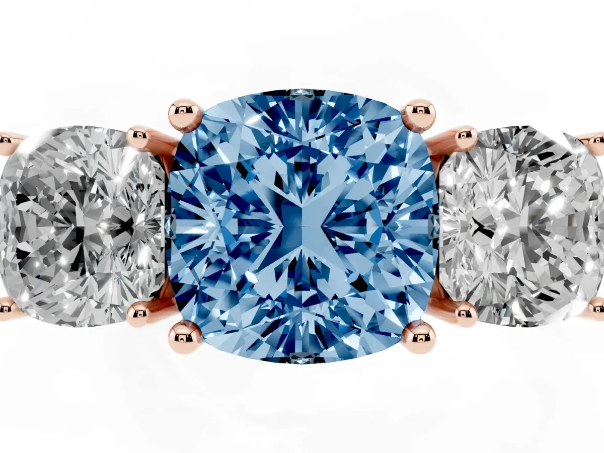 Fancy Blue Three-Stone Cushion Cut Cut Diamond Engagement Ring with Prong Setting on a White Gold Band Rose gold