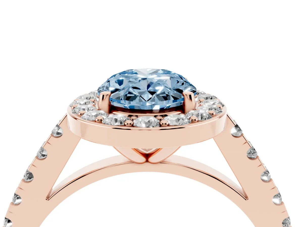 Fancy Blue Oval Cut Diamond Halo Ring with Round Pavé Split Shank and Prong Setting Rose gold