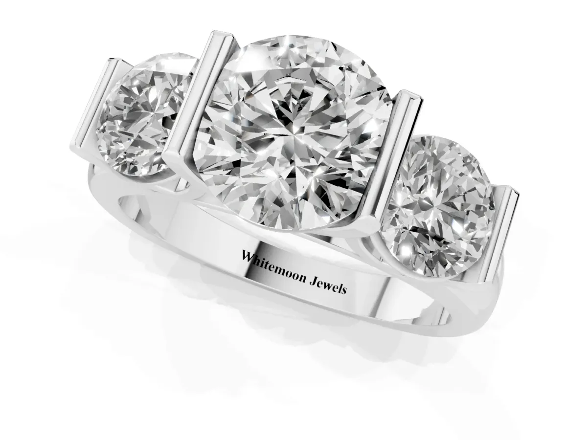 Three-Stone Round Cut Brilliant Diamond Ring with Channel Setting and White Gold Band Silver