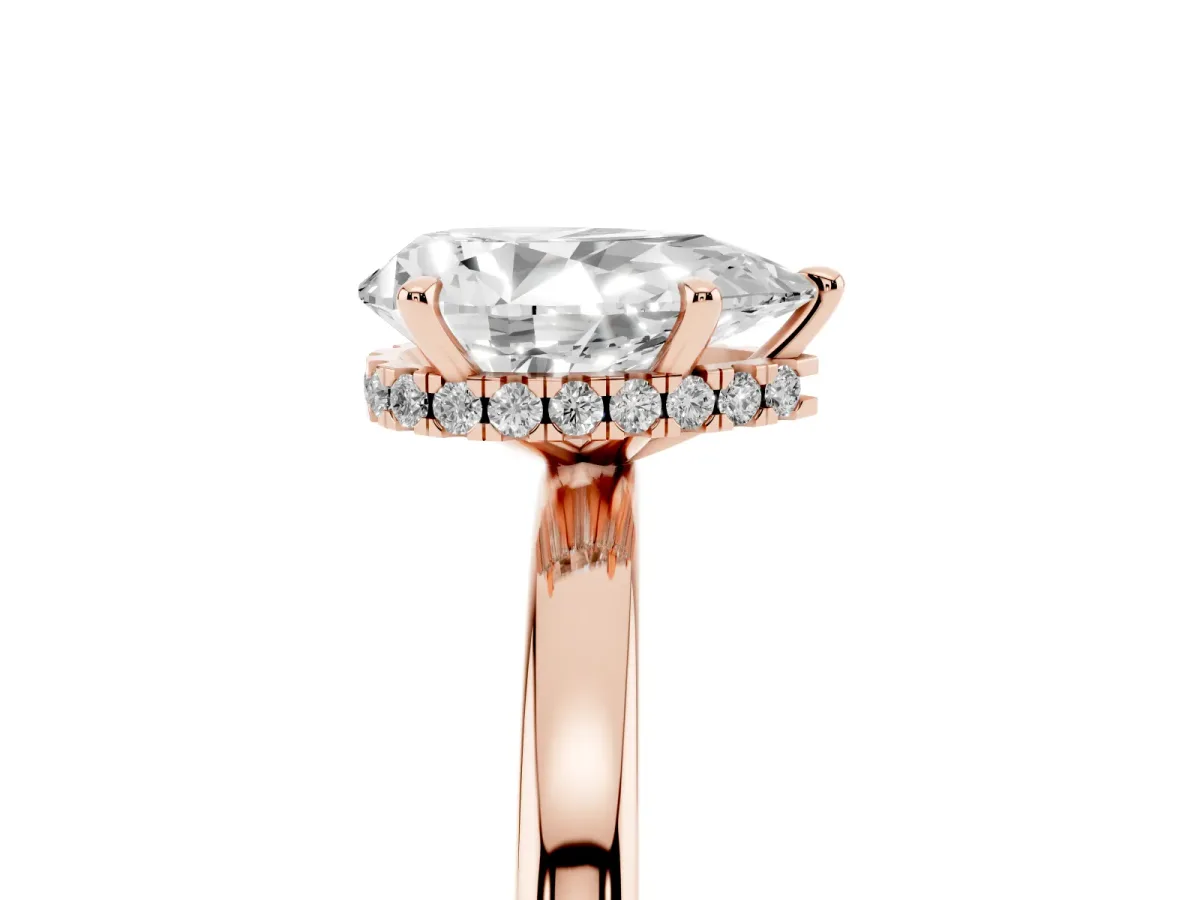 Pear Cut Solitaire Engagement Ring with Cathedral Band and Four-Prong Setting Rose gold