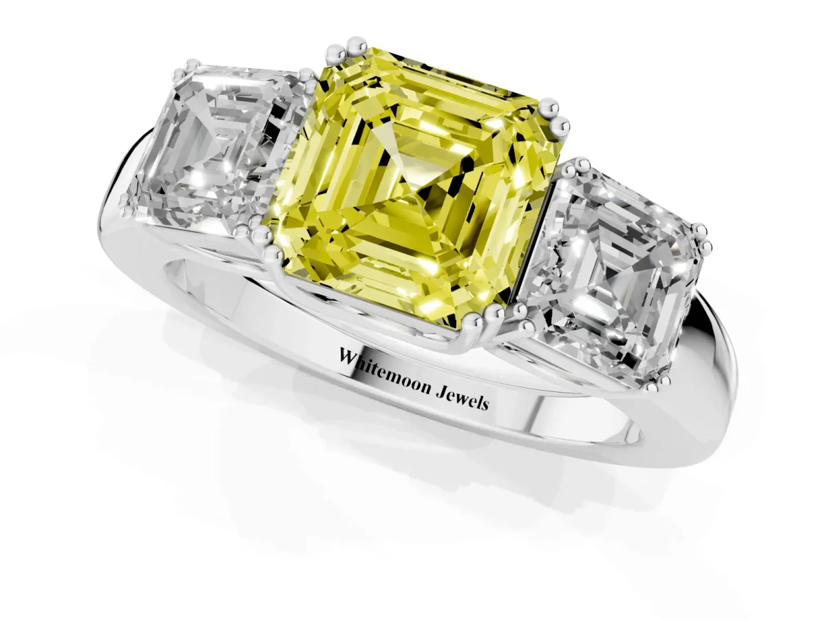 Fancy Yellow Three-Stone Asscher Cut Cut Diamond Ring with Channel Set Band and Four-Prong Setting White gold